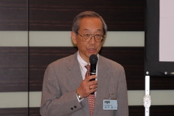 説明をする田中社長