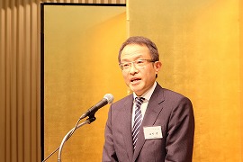 あいさつをする石川会長