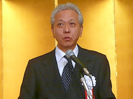 130127東機工1 あいさつする斎藤理事長
