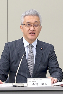 説明する山崎社長